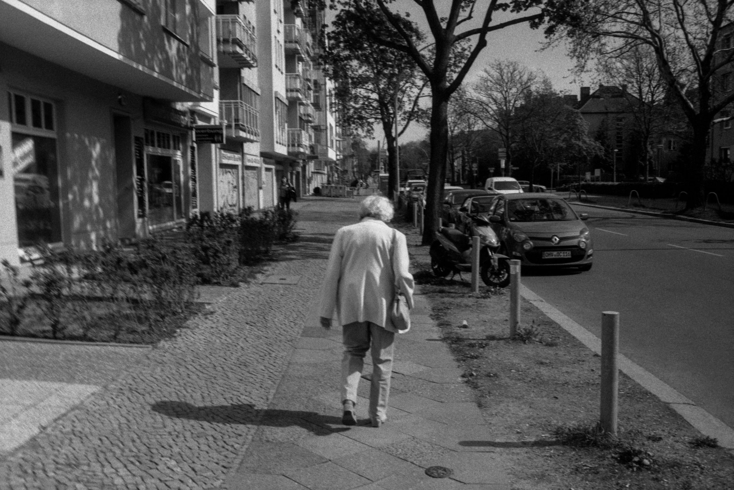 Evelyne Brix, 87, walks down a street in her neighbourhood in Berlin. She spent her whole live living in East-Berlin. 