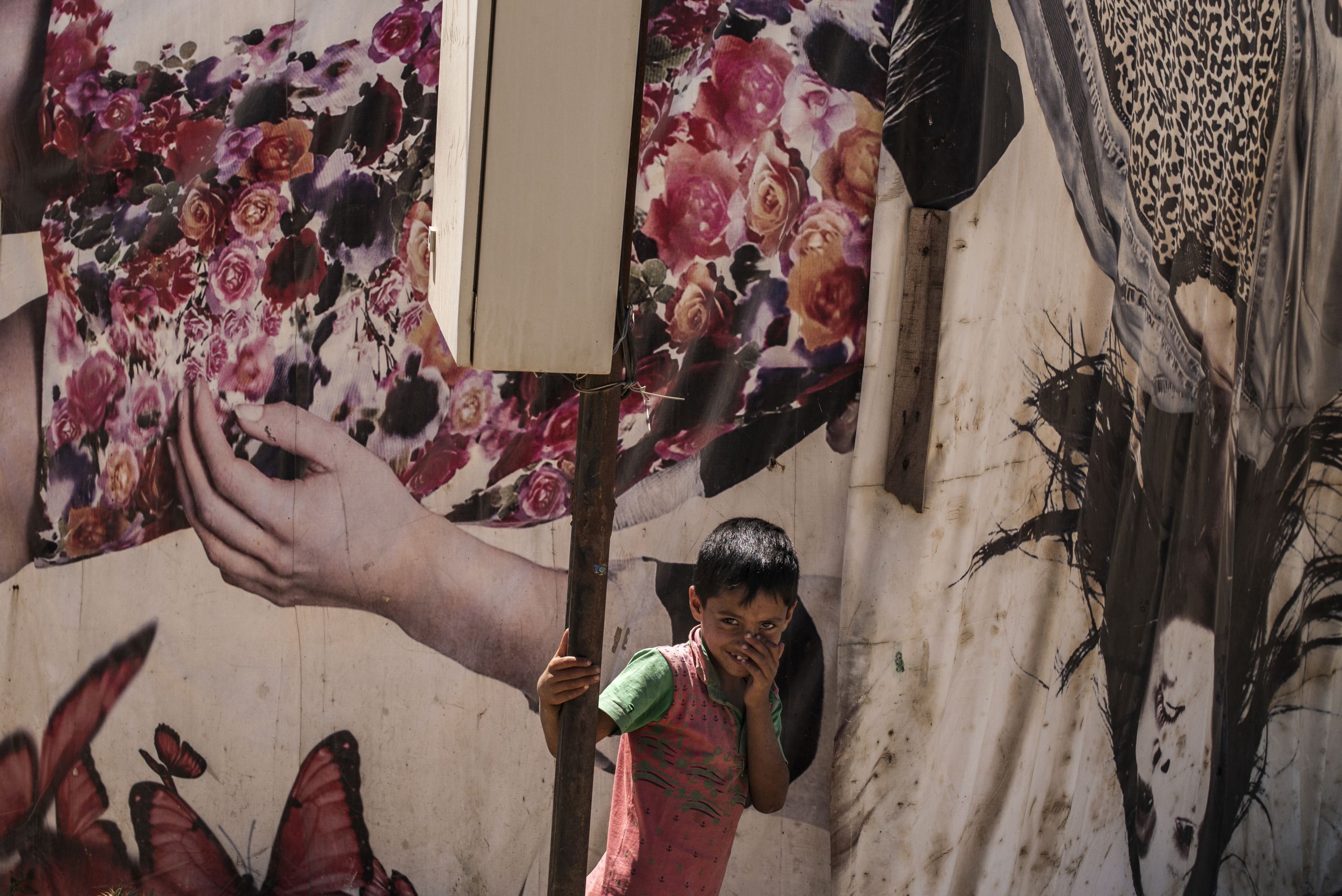  A young boy playing in an informal settlement in the Beeka Valley in Lebanon.