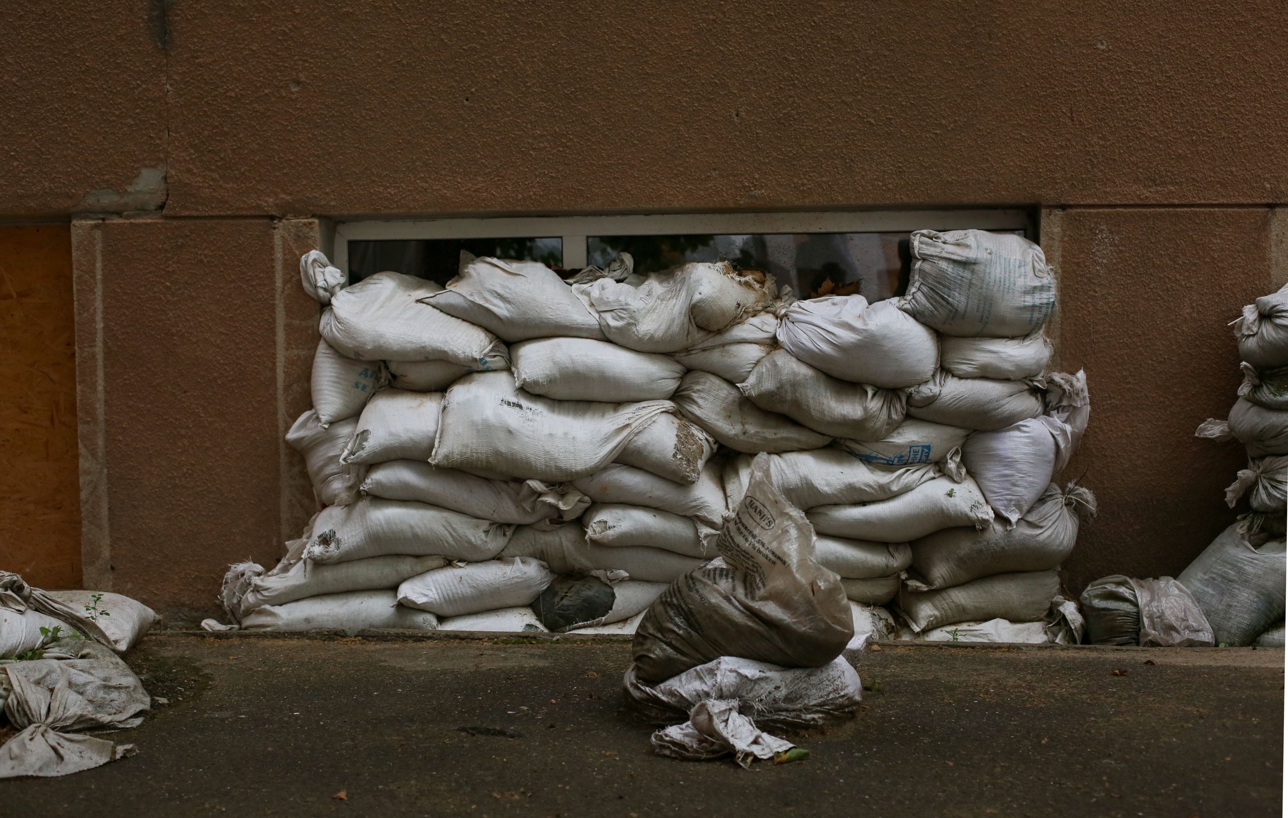 Sandbags protect the windows of a school in Ukraine